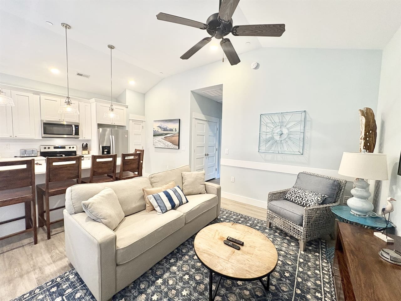 Open-concept living room and kitchen with comfortable seating