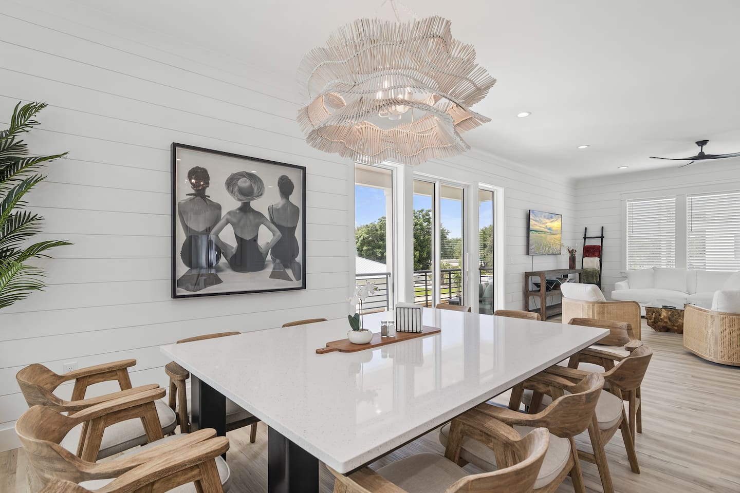 Enjoy a stylish dining space with modern art and beautiful lighting.