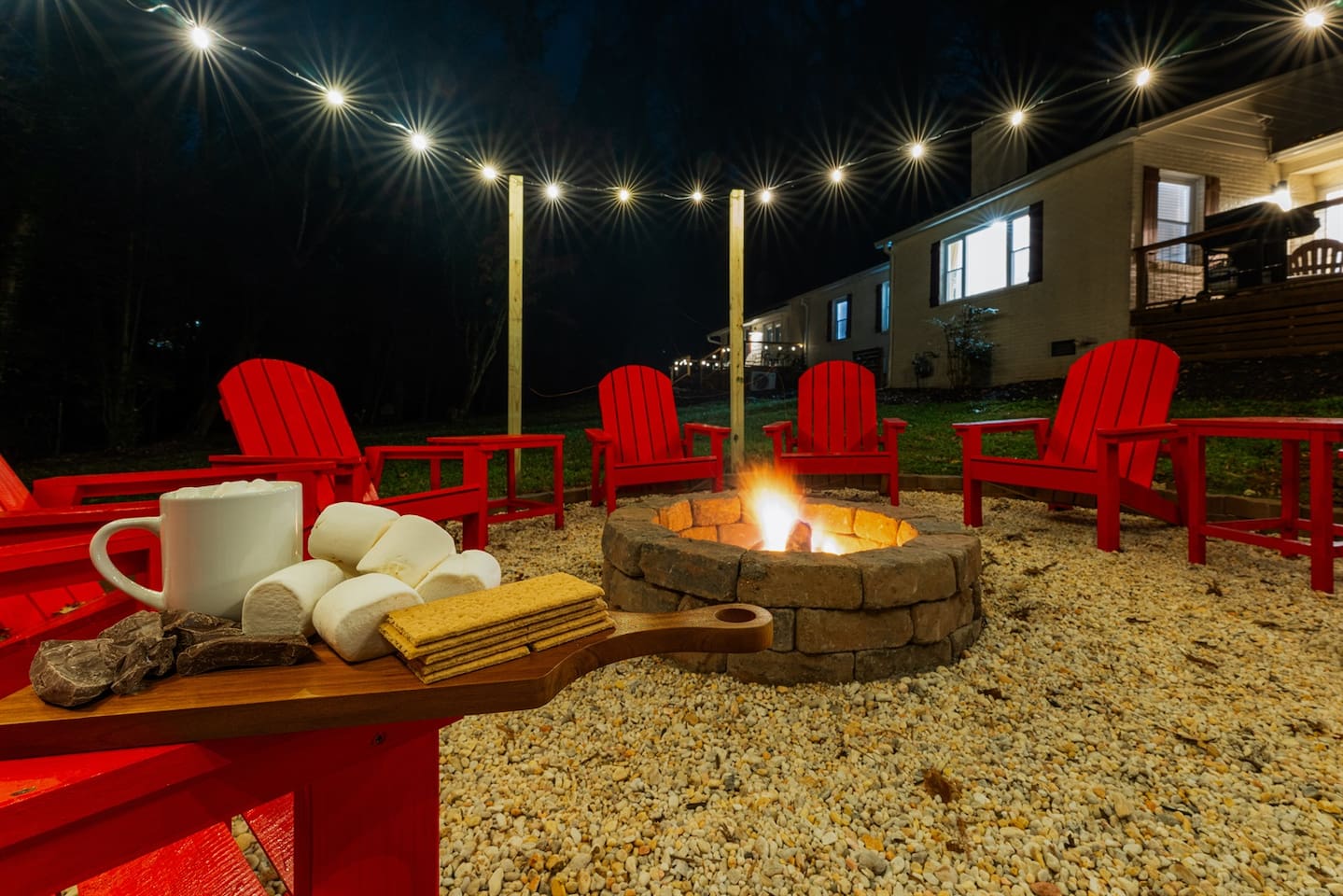 Enjoy unforgettable nights around the fire with cozy seating, string lights, and everything you need for the perfect s’mores experience.