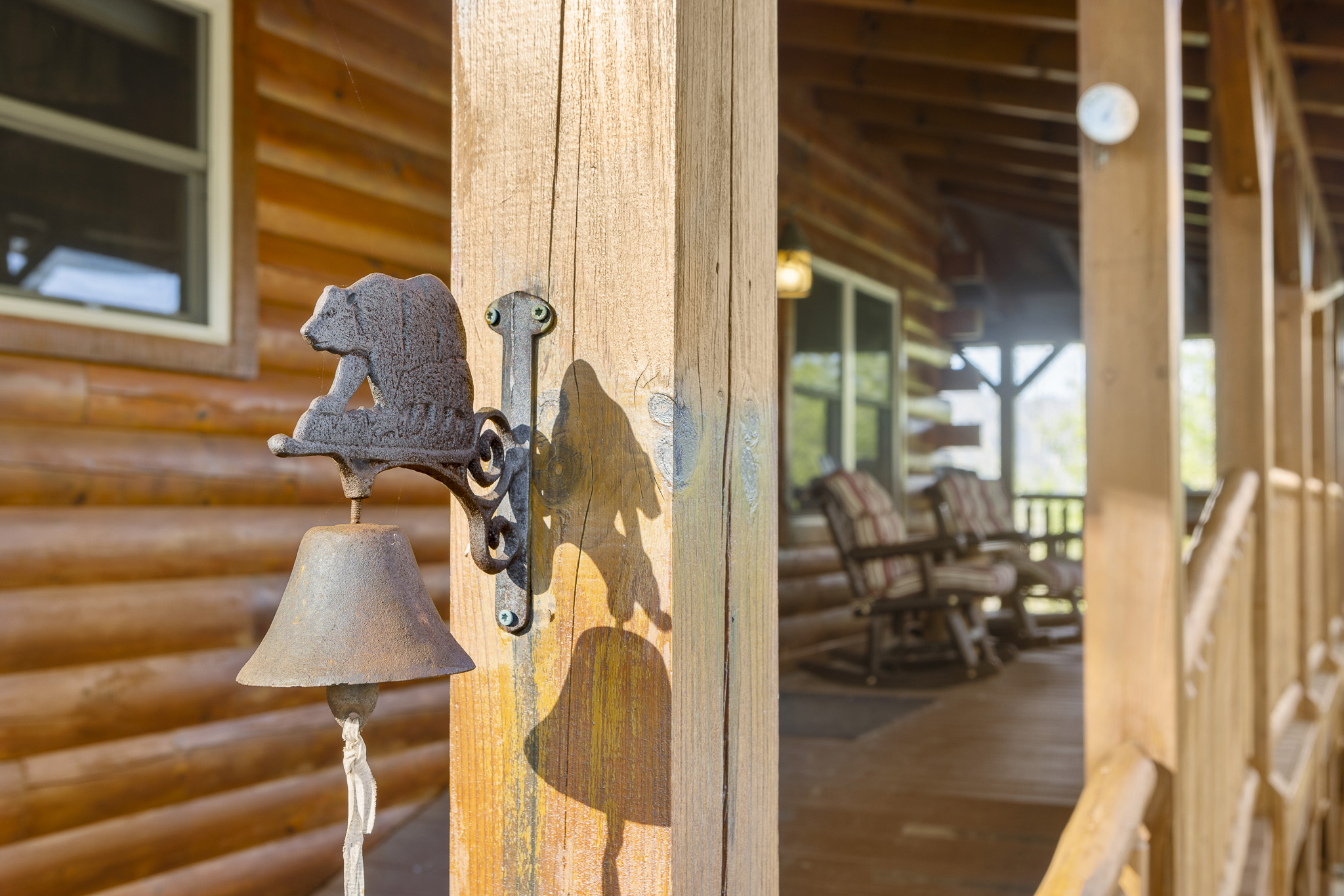 Front Porch: Ring the bell and unwind on rockers with stunning mountain views!
