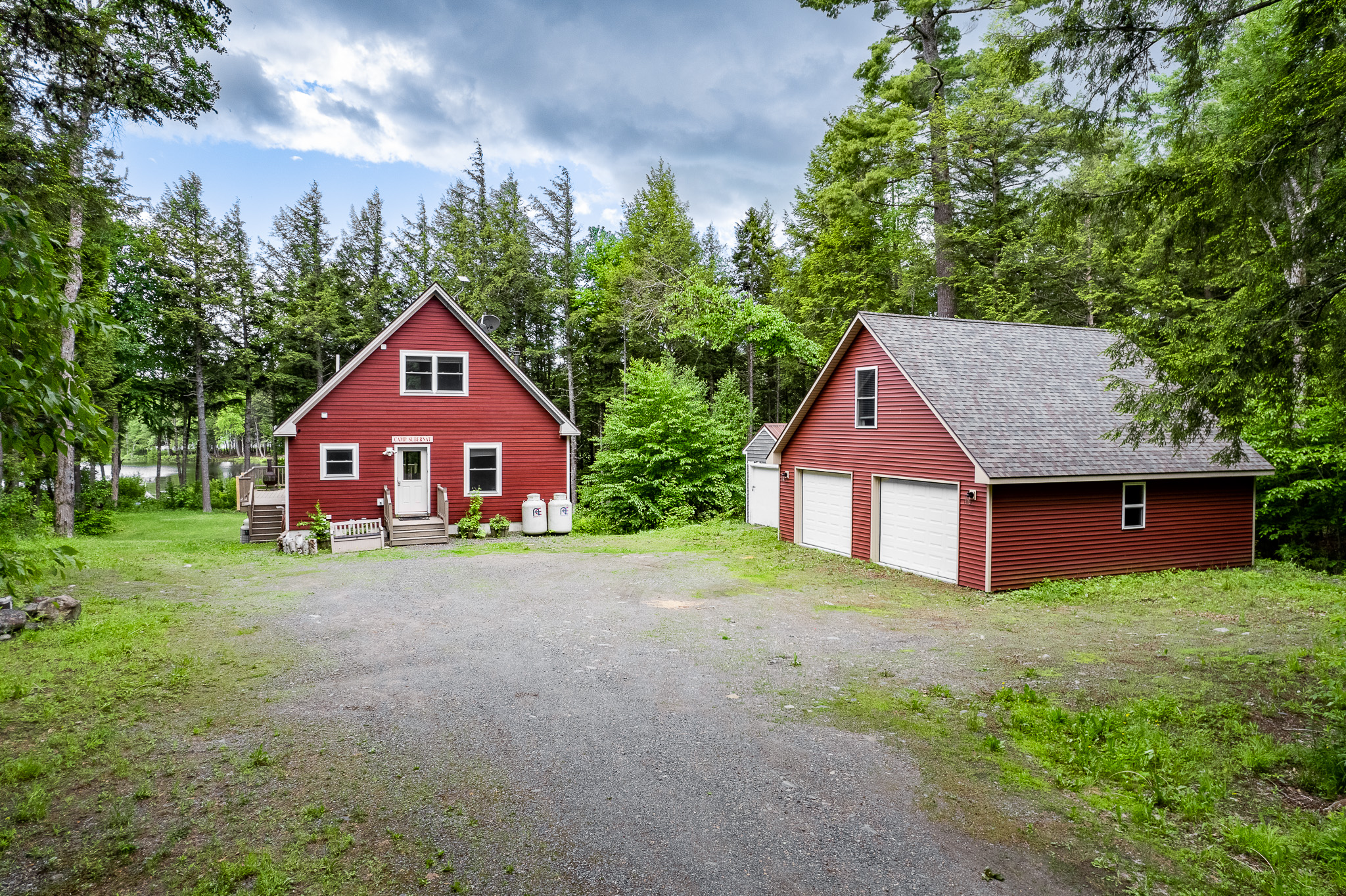 Large parking area in front of the house. Plenty of room for trucks with trailers. Garage has fully finished loft available for additional rental as a 4th bedroom that sleeps up to 4 guests.