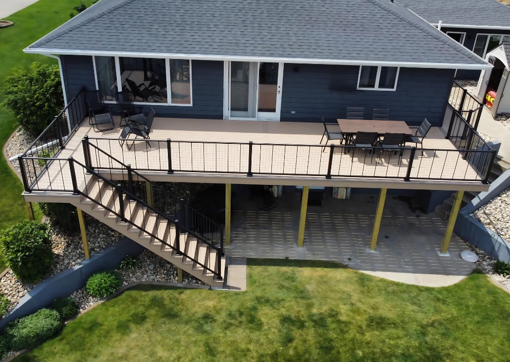 View of new deck. Table that fits 7 people.