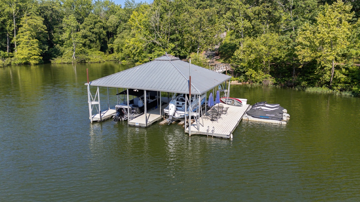 Your private covered dock is the family’s lake headquarters, with room to relax, launch kayaks, fish, swim, and enjoy the water.
