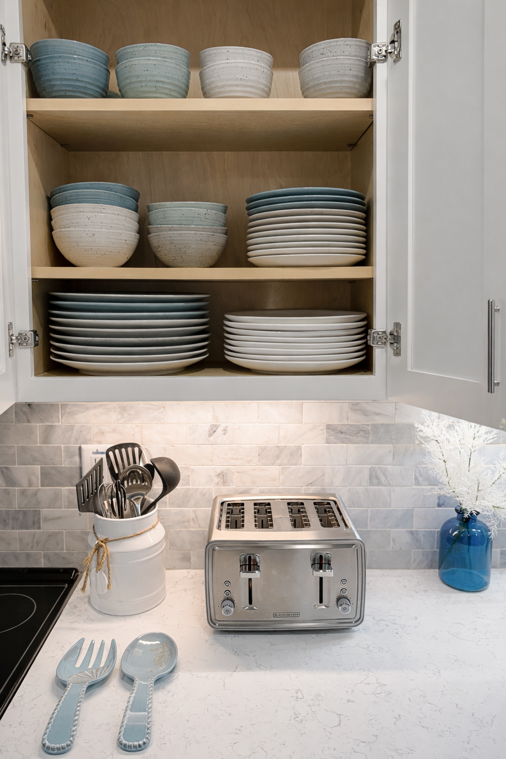 Kitchen essentials and dishware to serve 10 or more.