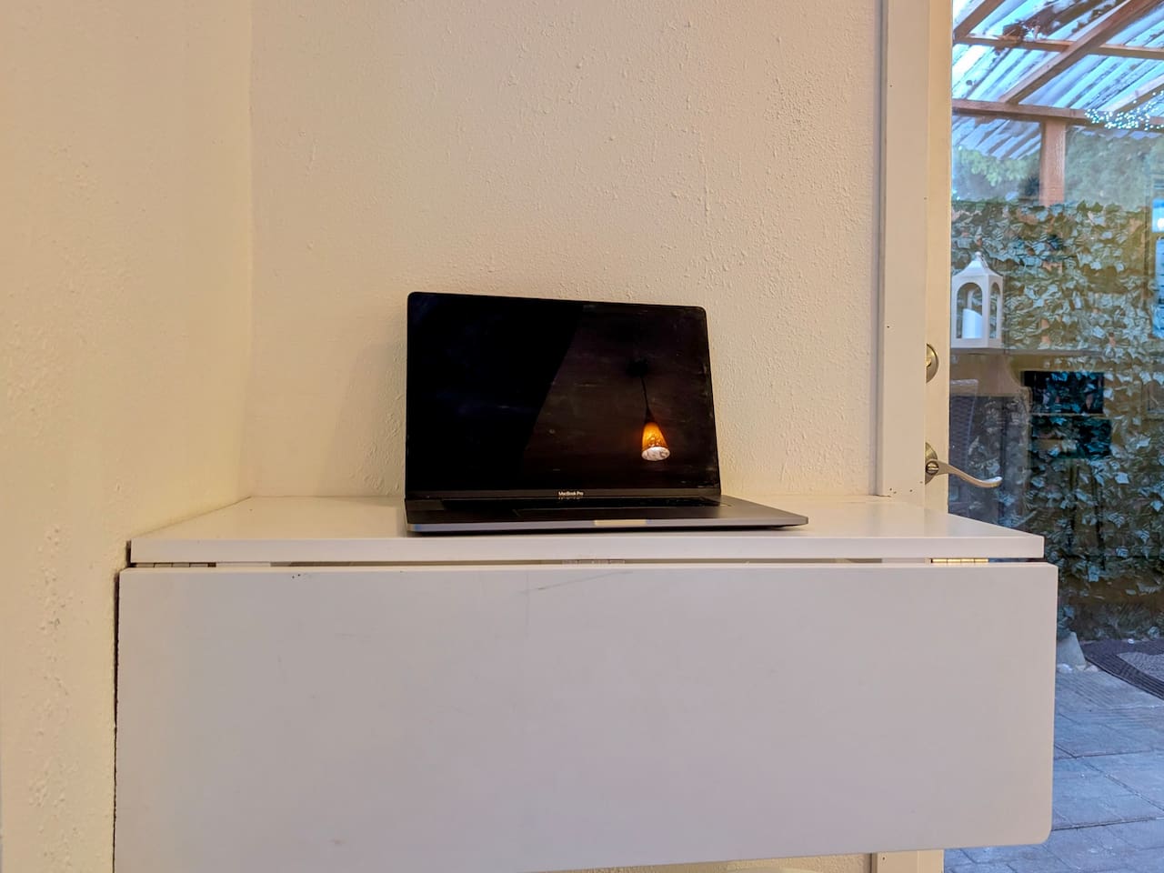 Fold-down desk for work or study.