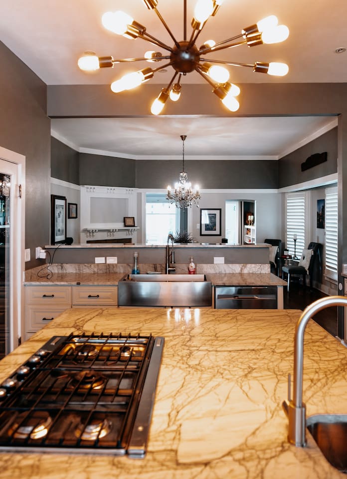 Large open kitchen and dining room. The words "fully stocked" would be an understatement. 