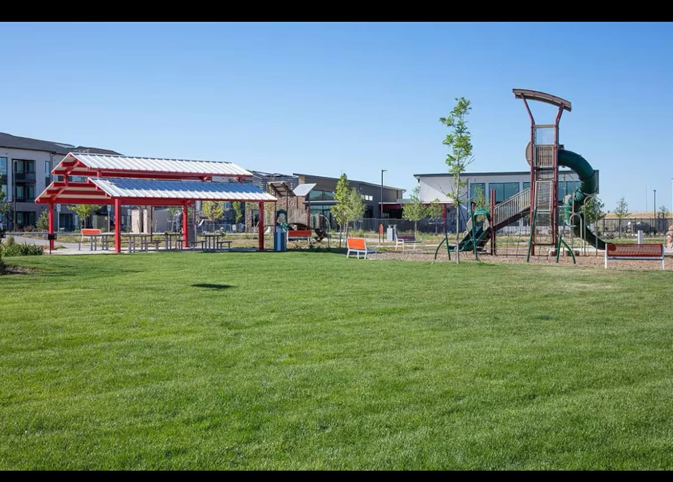 Our community playground, just a minute away, is a child's paradise with a slide, a jungle gym, and plenty of space to run on the large grassy area. 
