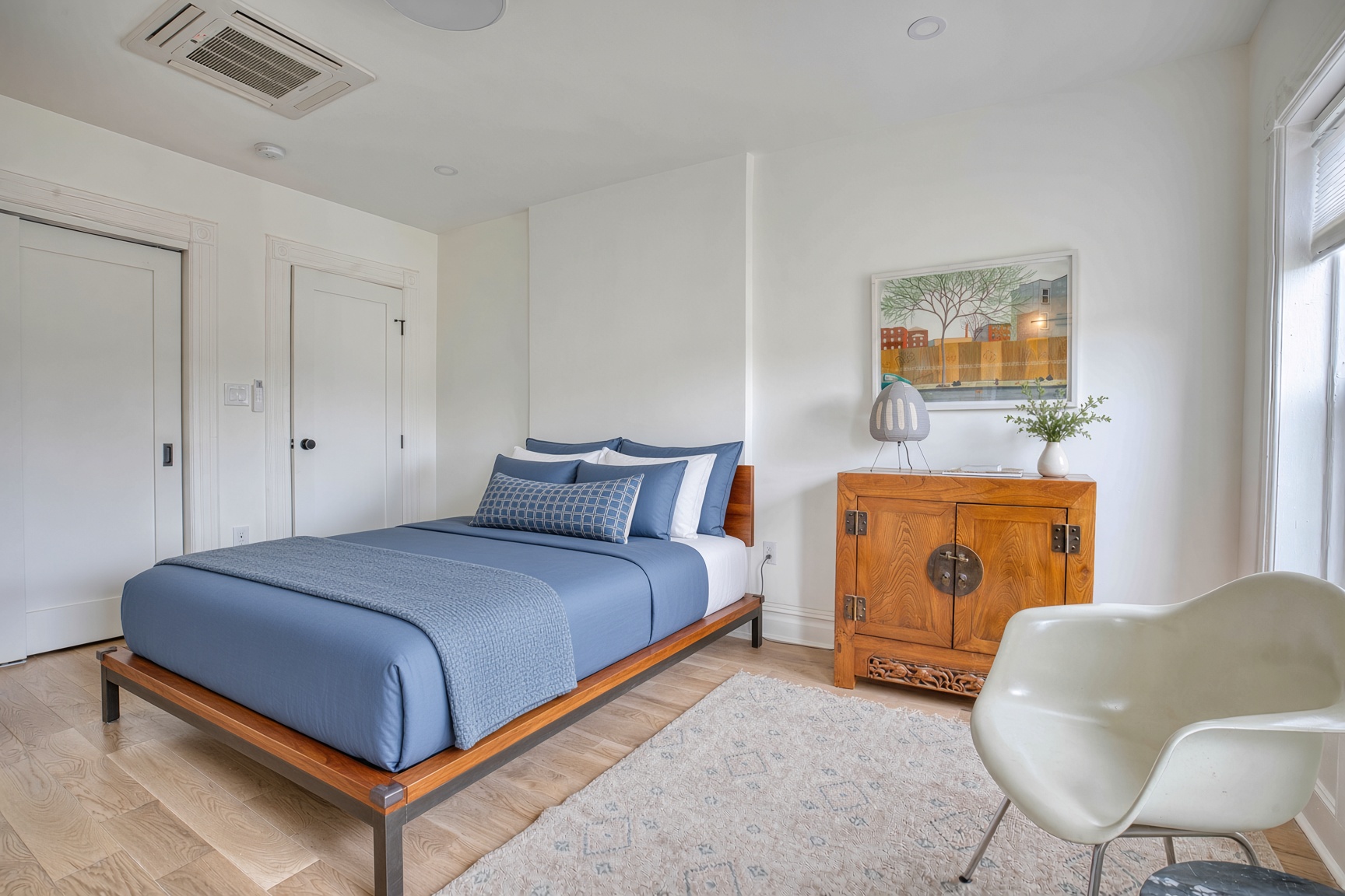 Queen sized bed on the upper floor of duplex complete with en-suite bathroom with heated floors for additional comfort.