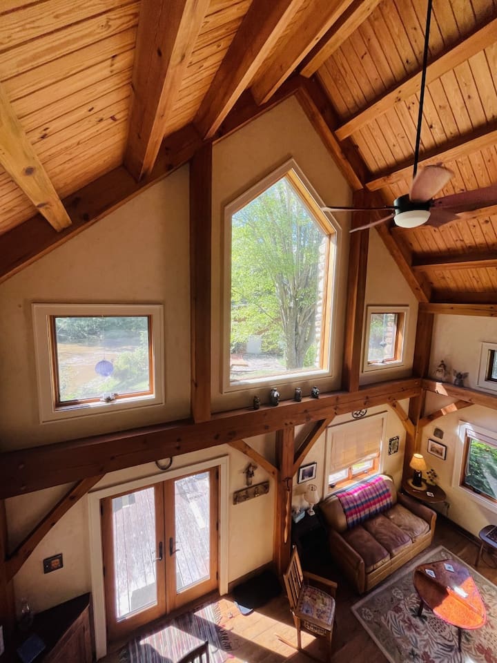 Looking out the picture window from the loft bedroom