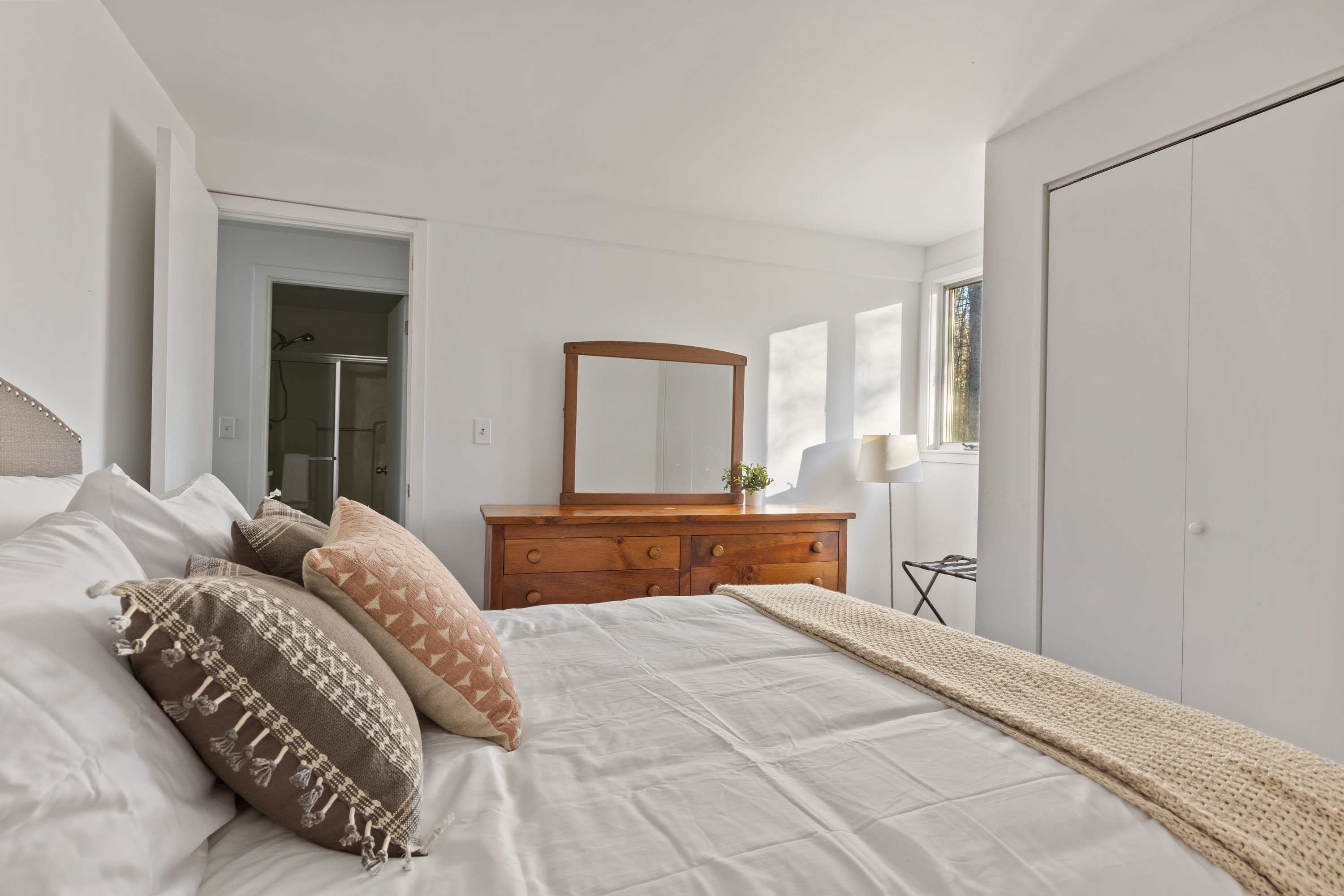 Queen Bedroom: Bright and airy space with plush bedding and vintage charm for restful nights!