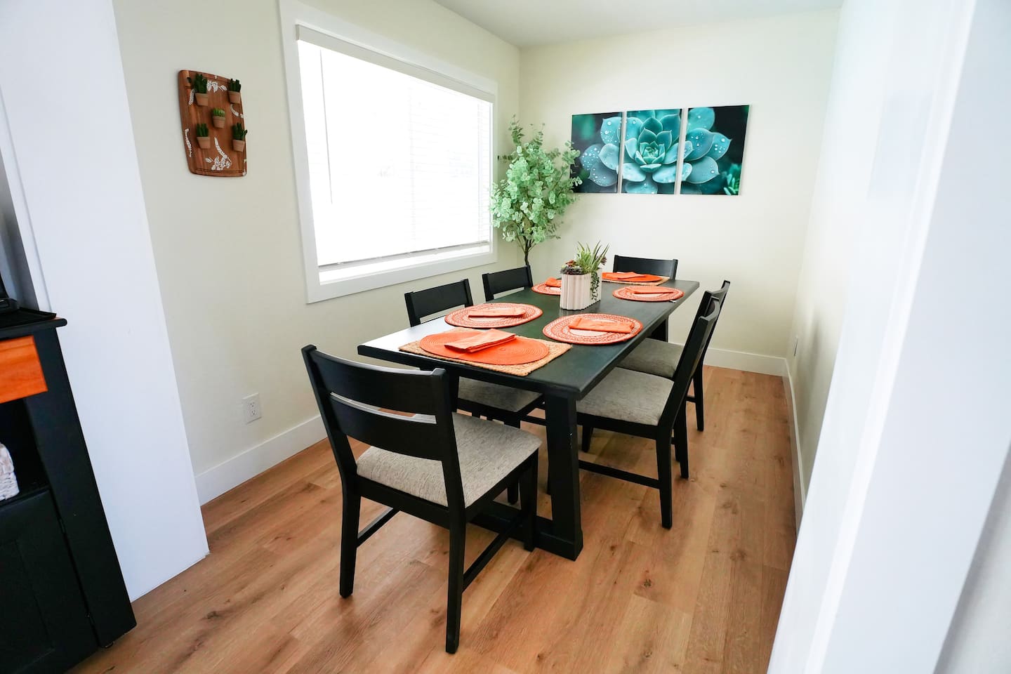 Cozy dining area with comfortable seating, ideal for meals, gathering and quality time together. 