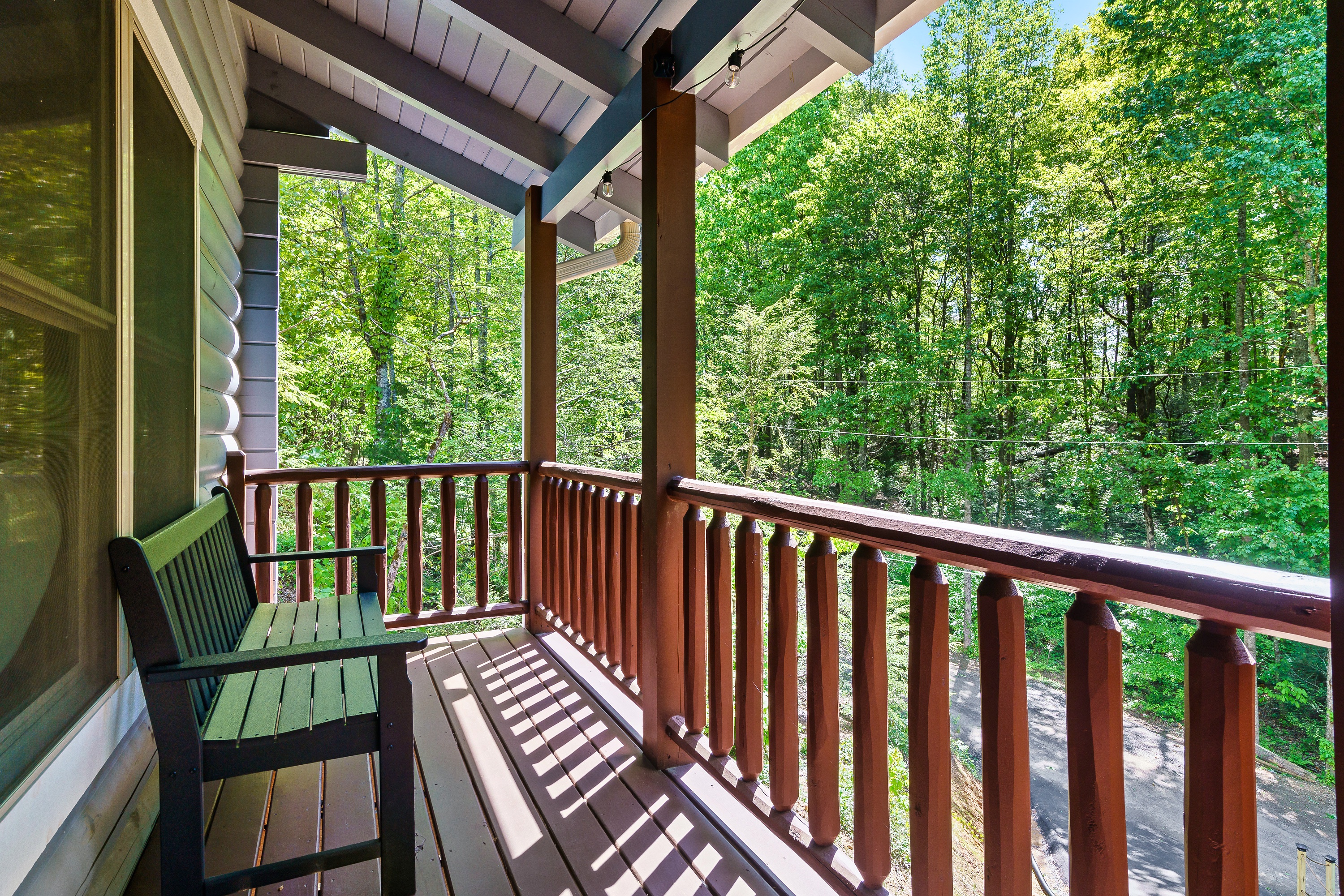 Bench seating on one of the porch...take in the scenery.