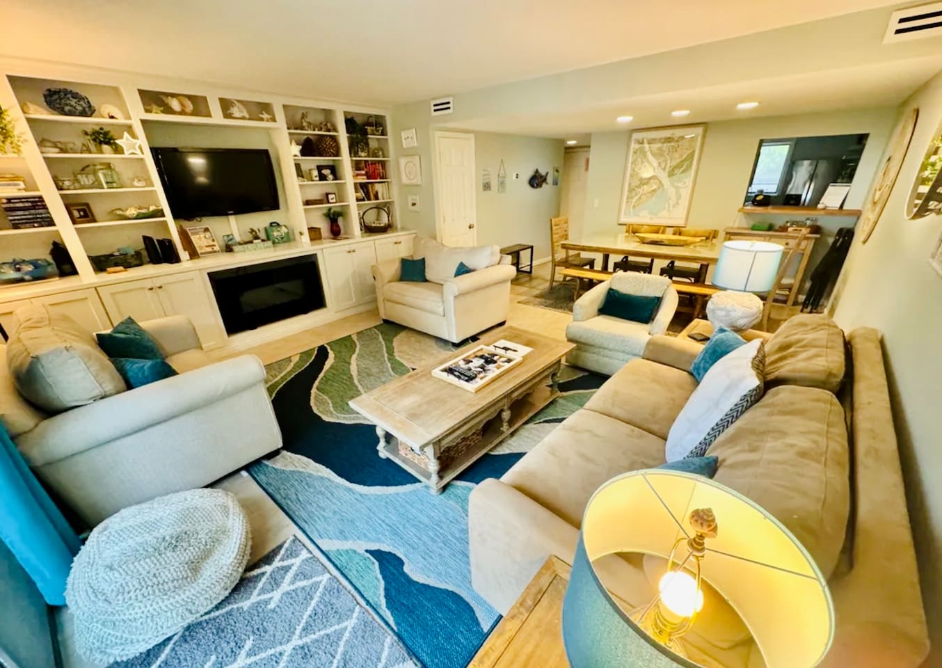 Living room with built-in shelves and Smart TV