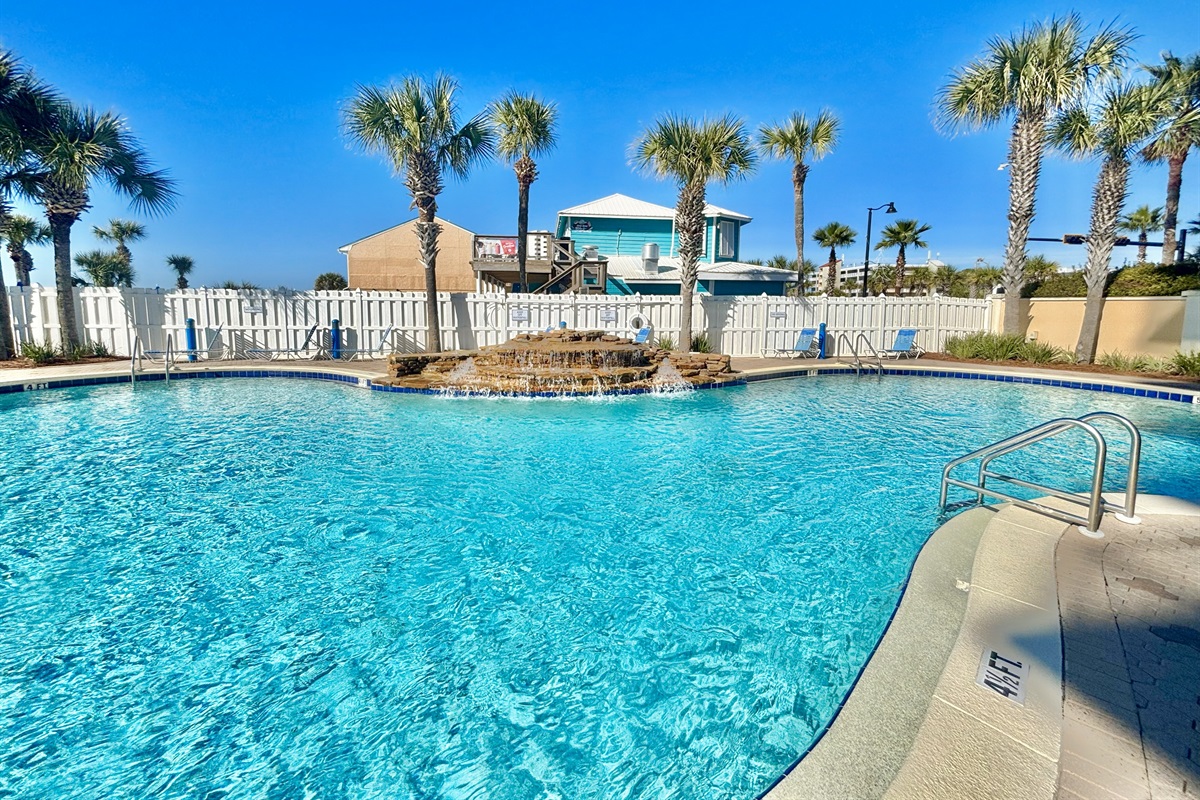 Outdoor pool with a waterfall!
