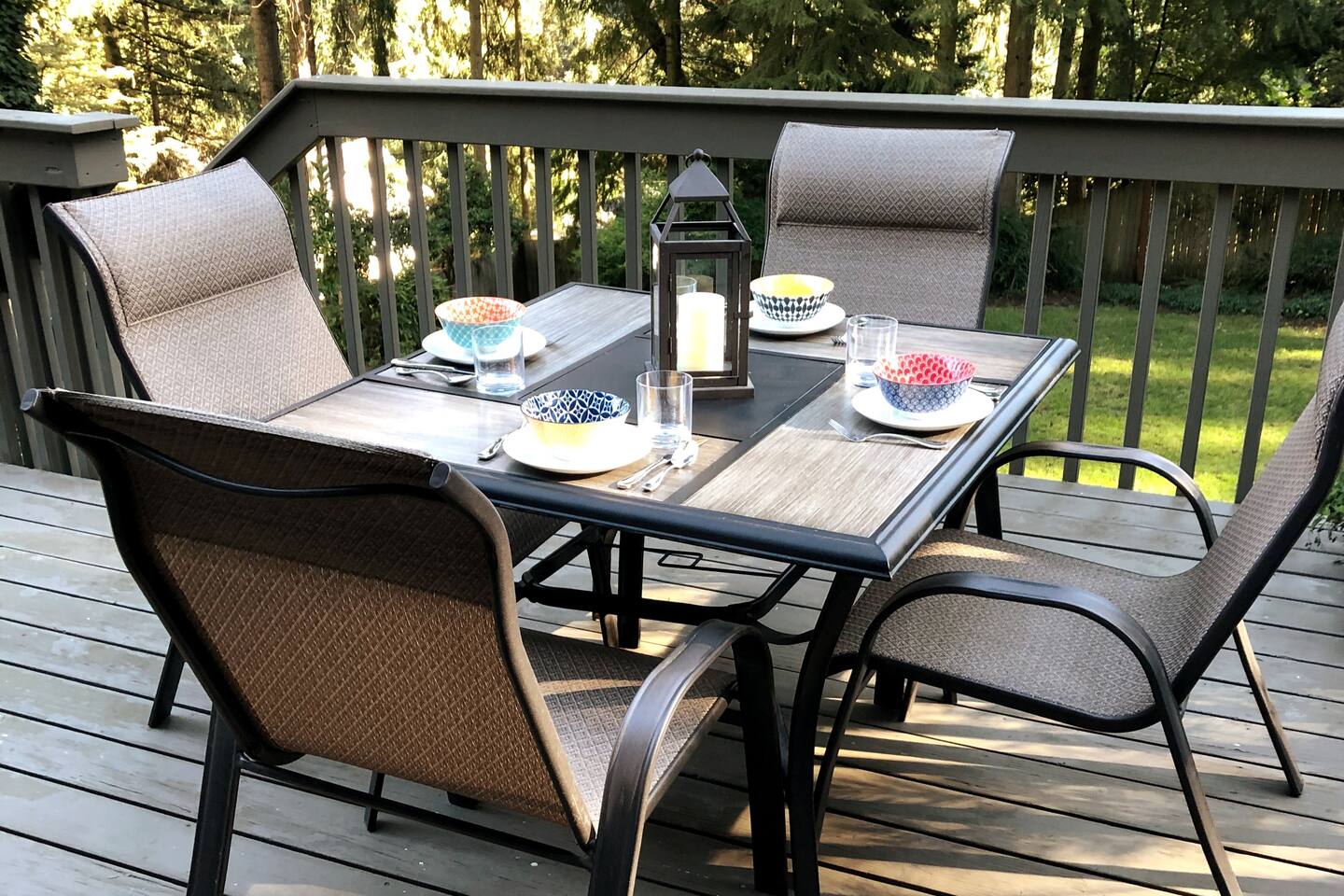 Upper deck with view of the fenced back yard