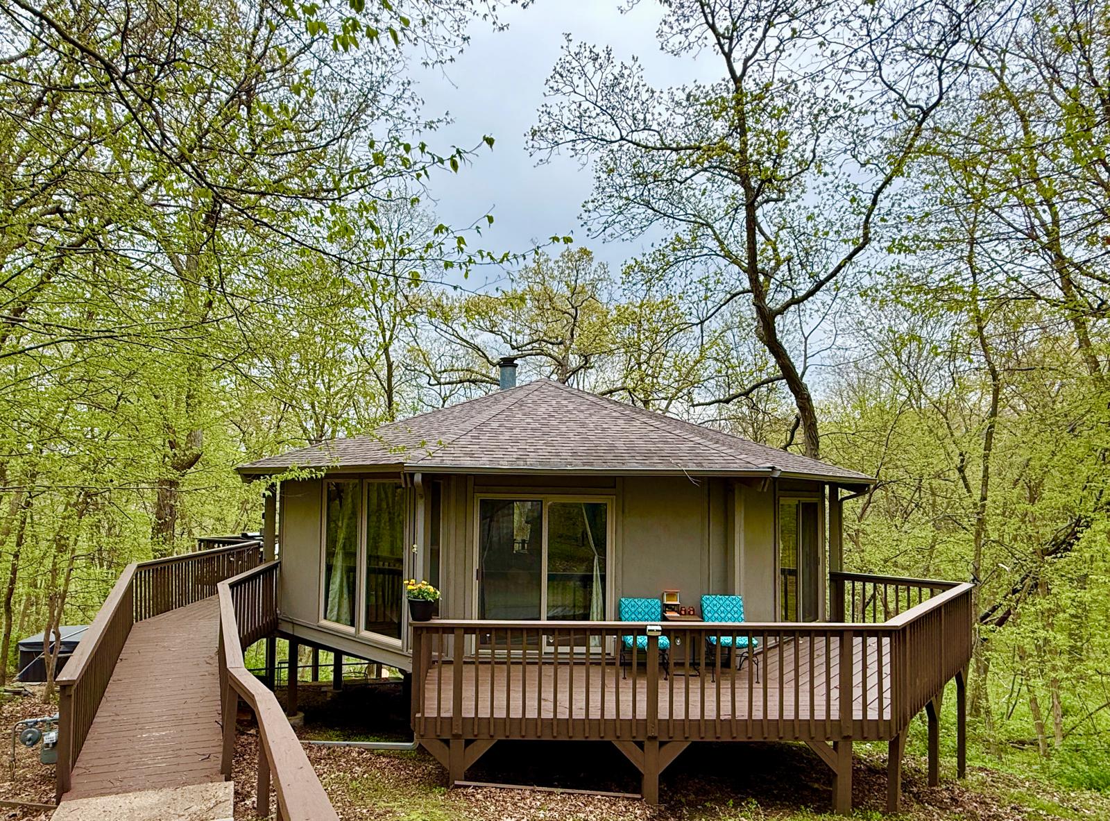 Front of this fun octagon "tree house" the Retro Nest has 2 steps, then long ramp to house
