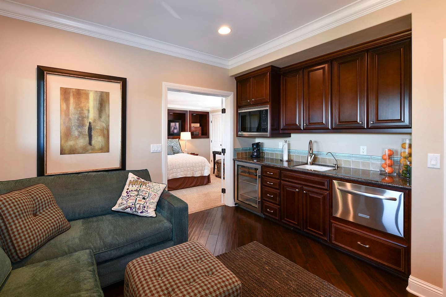 Bedroom suite 4 with living area, kitchenette, queen bed and full bathroom.