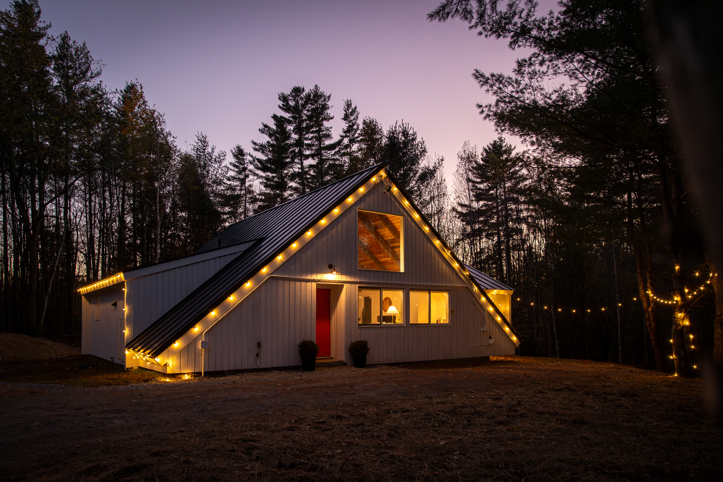 Welcome to Stratton Ski Haus - your modern A-frame retreat with magical twilight ambiance