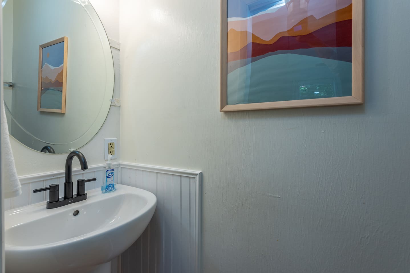 Cute extra clean 1/2 bath in Bedroom 2 -Front street side cleaned toilet & sink w hand antibacterial soap