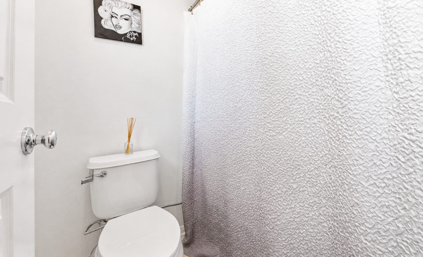Small bathroom with a shower, simple essentials, and a clean setup for daily use.
