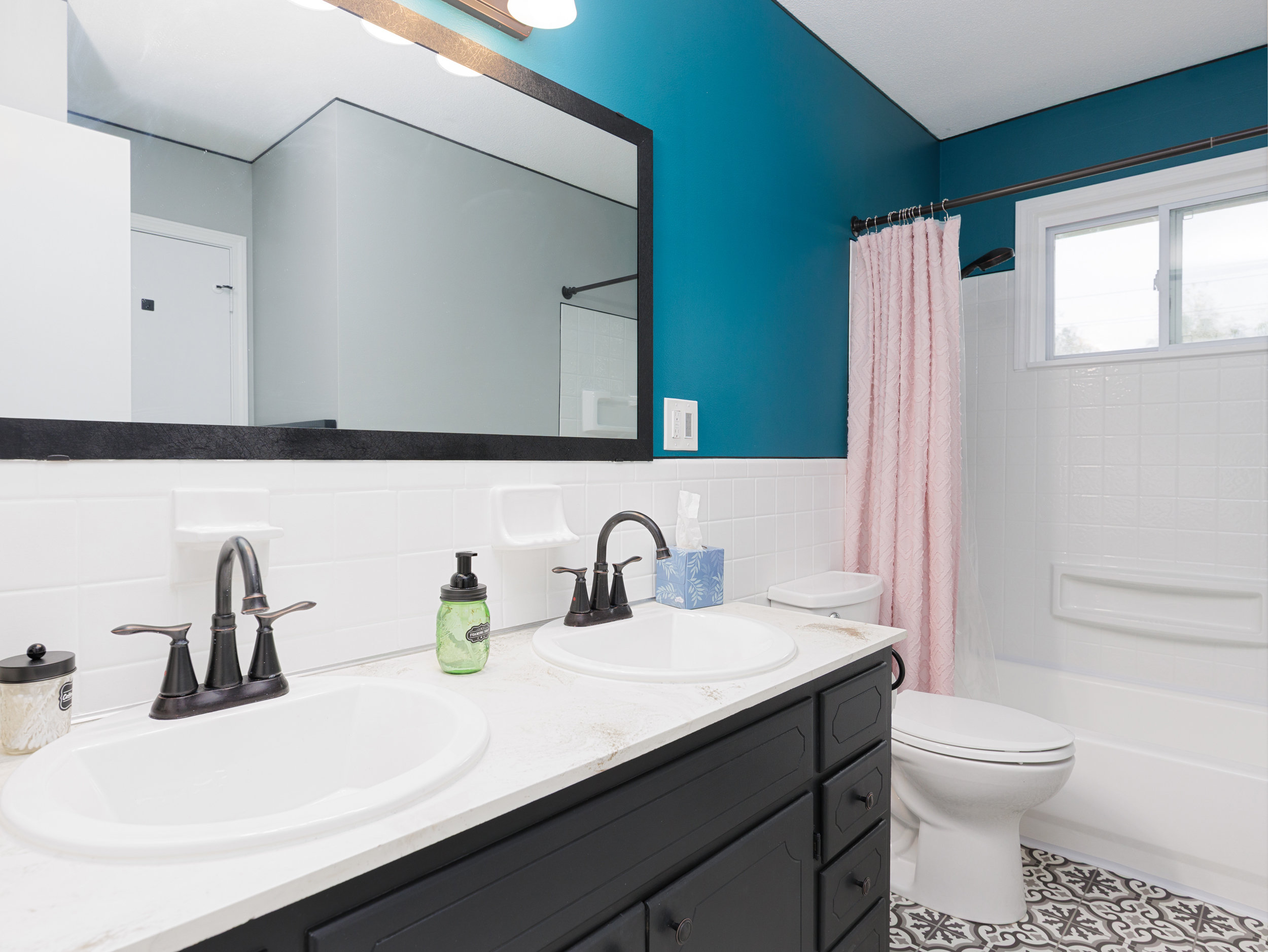 Bathroom vanity with storage and counter space for everyday convenience.