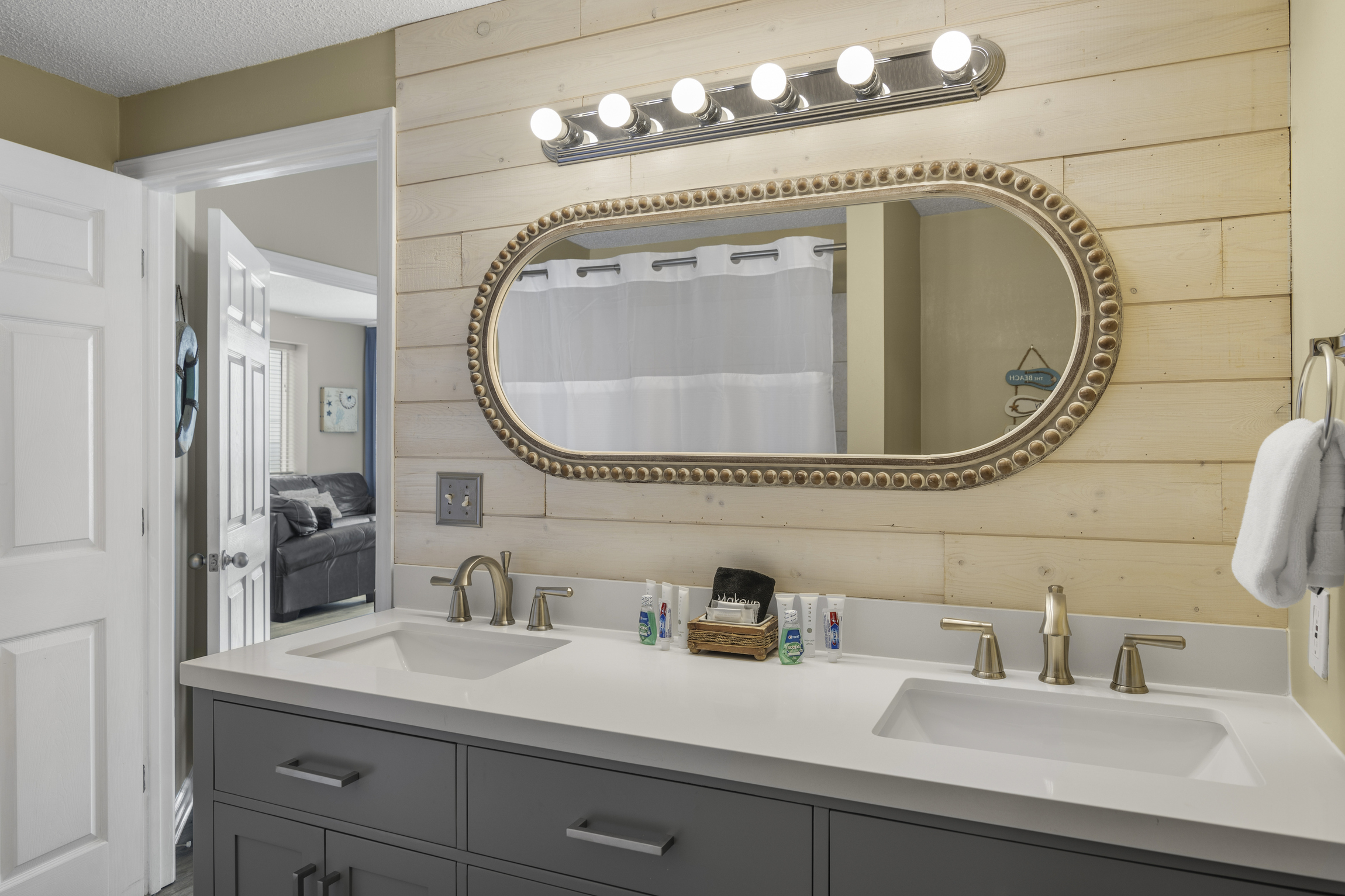 Master Bathroom has updated dual vanity and shower/tub combo