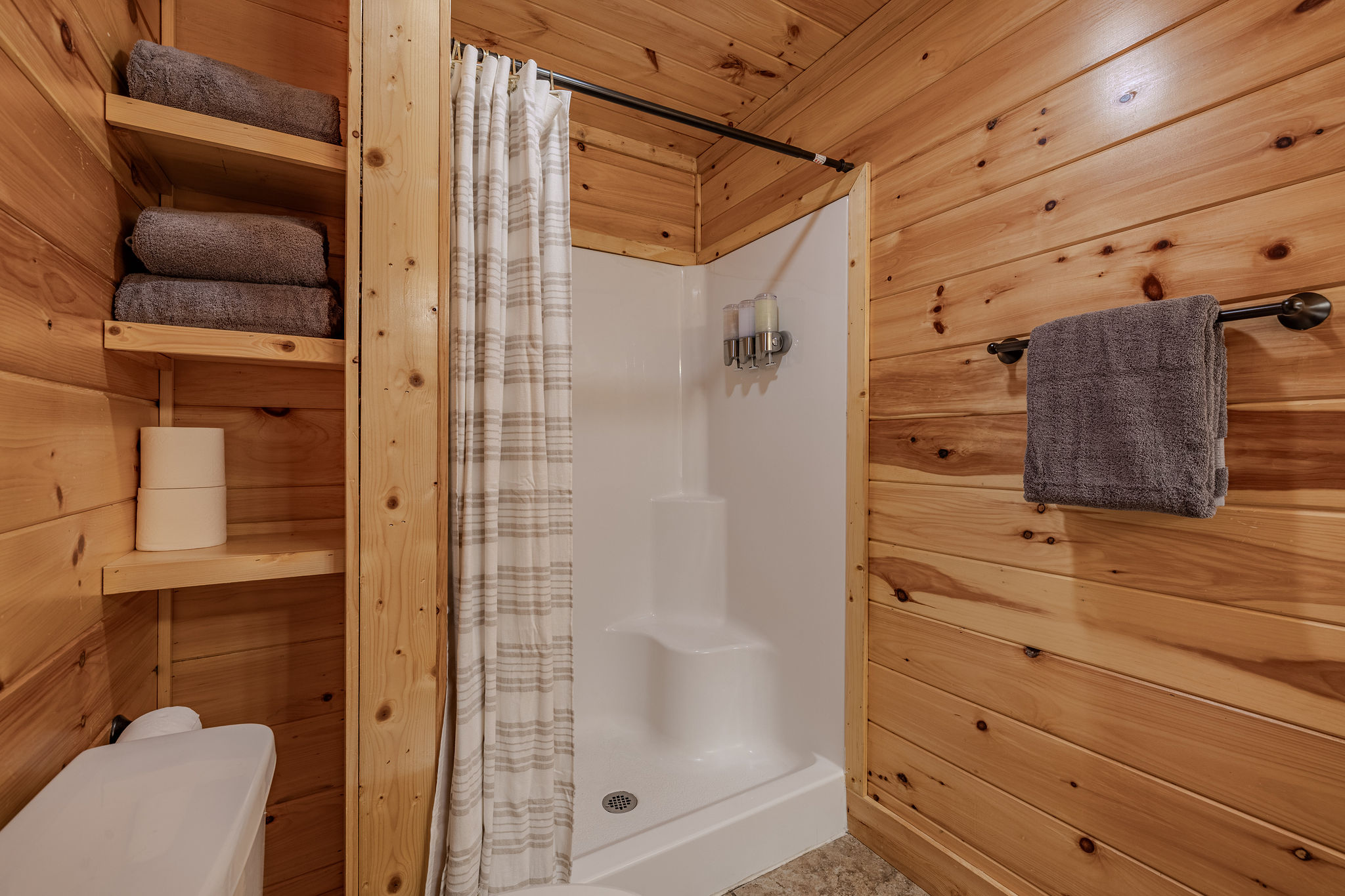 The Rhythm Suite Ensuite Bathroom serves the lower-level king suite, creating a private retreat close to The Soundstage Cinema and Afterparty Deck.