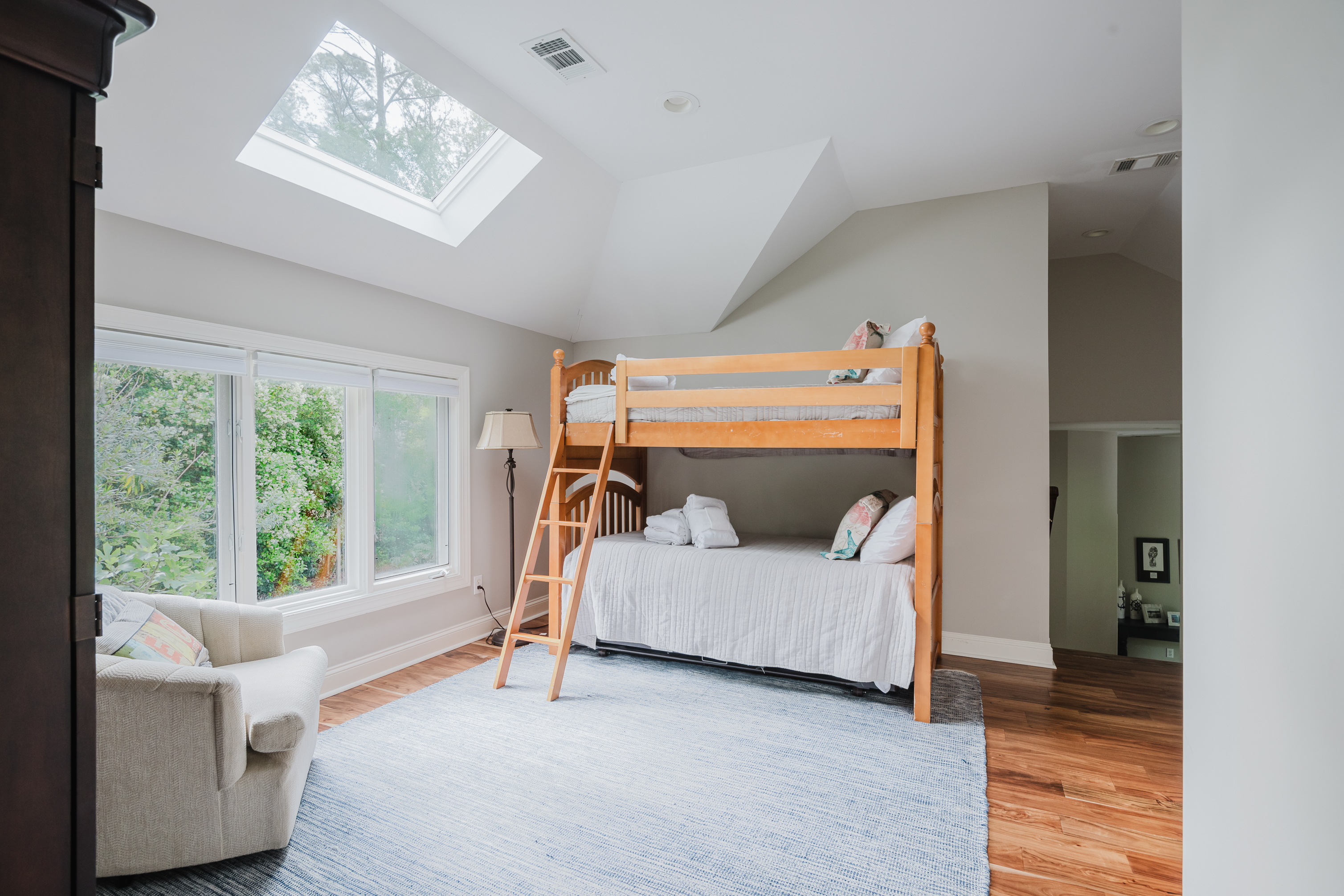 Two Bunkbeds and a trundle bed in the kid's area