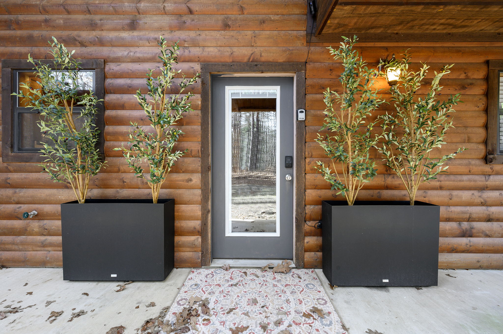 Classic cabin architecture surrounded by nature; a refined mountain escape designed for comfort from the moment you arrive.