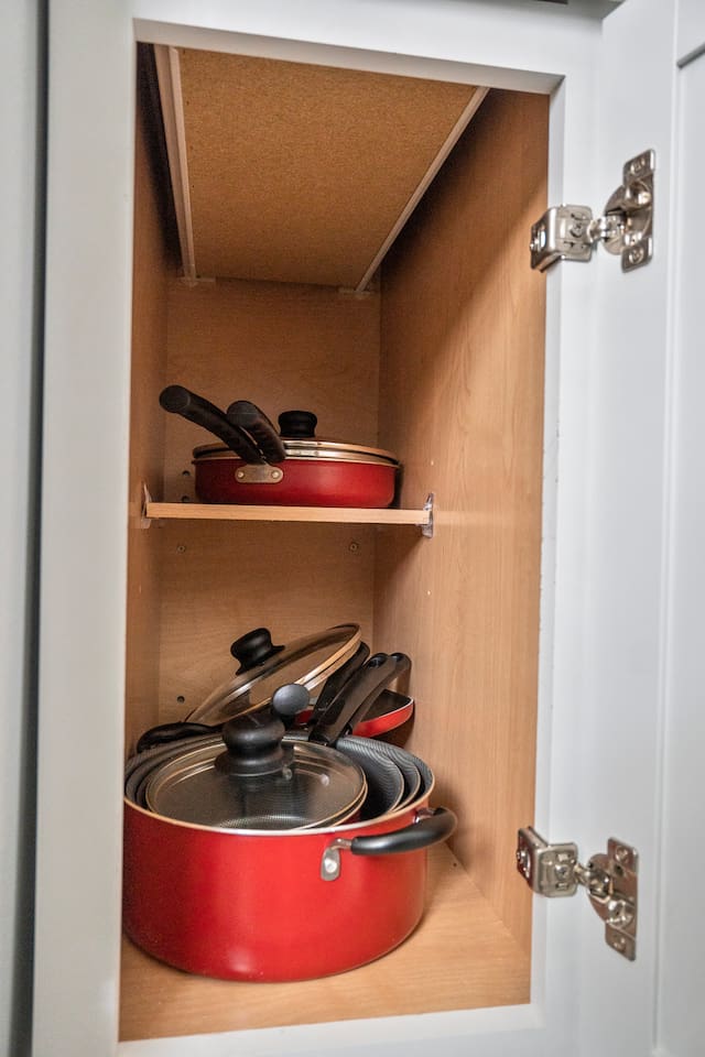 Fully stocked kitchen with utensils, perfect for preparing meals with ease.
