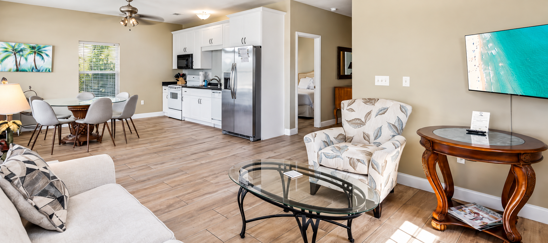 First Floor: Bright open-concept with a full kitchen, comfortable living area, and dining space.