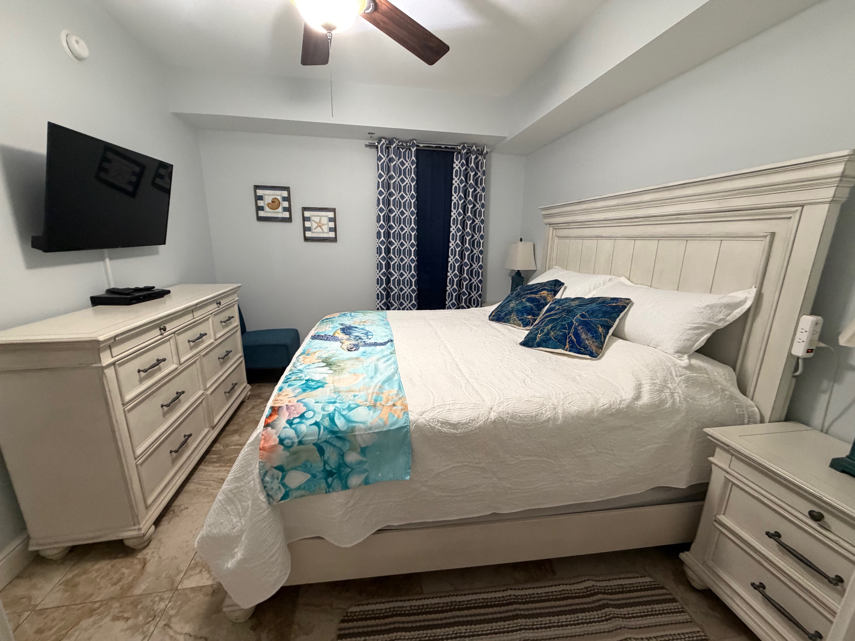 A charming guest bedroom that gives everyone their own comfortable place to recharge.