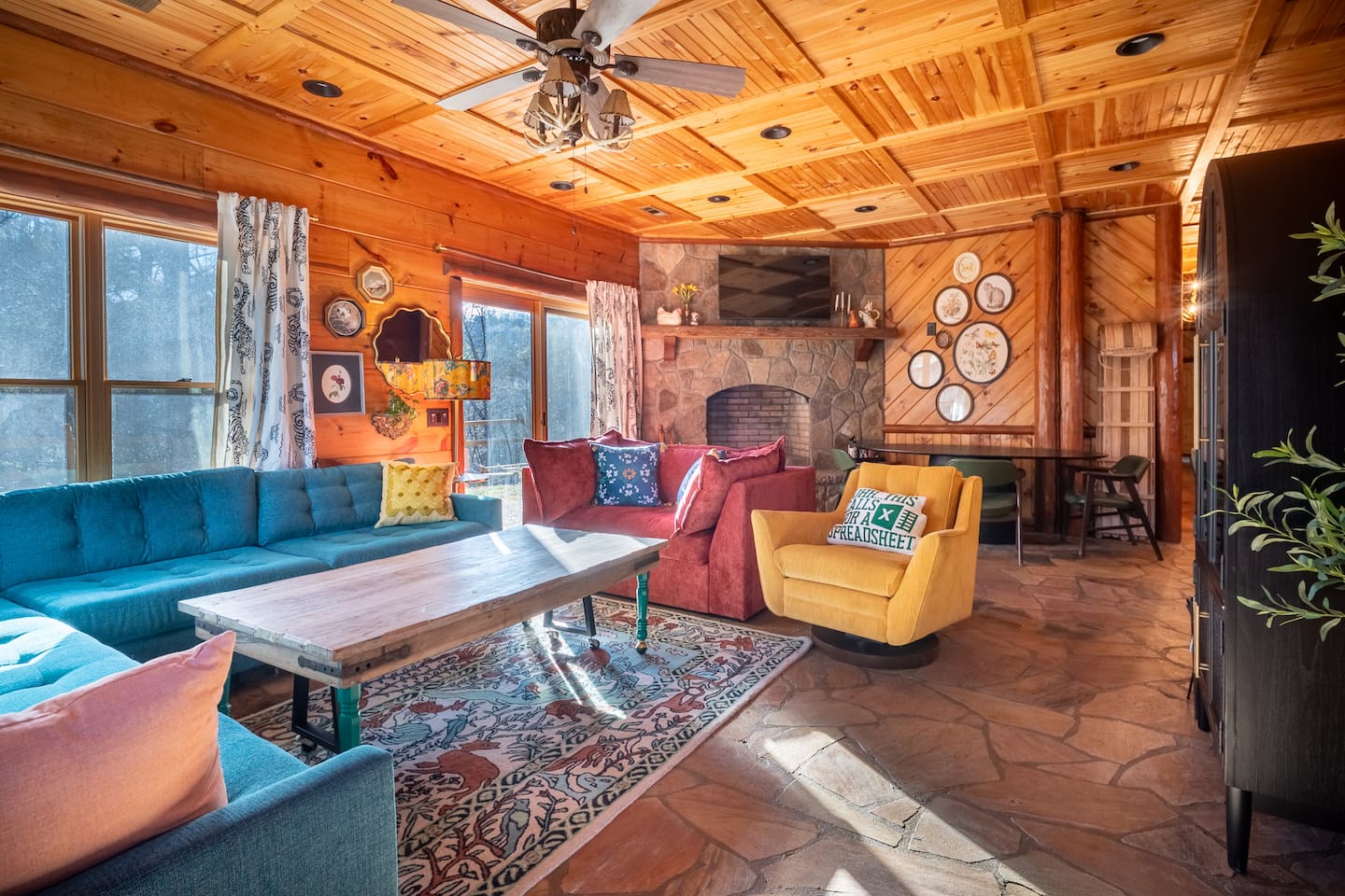 Living space with games and sleeper sofa on bottom floor. 