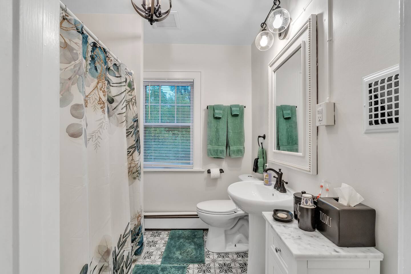 Spacious Full Bathroom with tub/shower. All amenities included. Soft towels