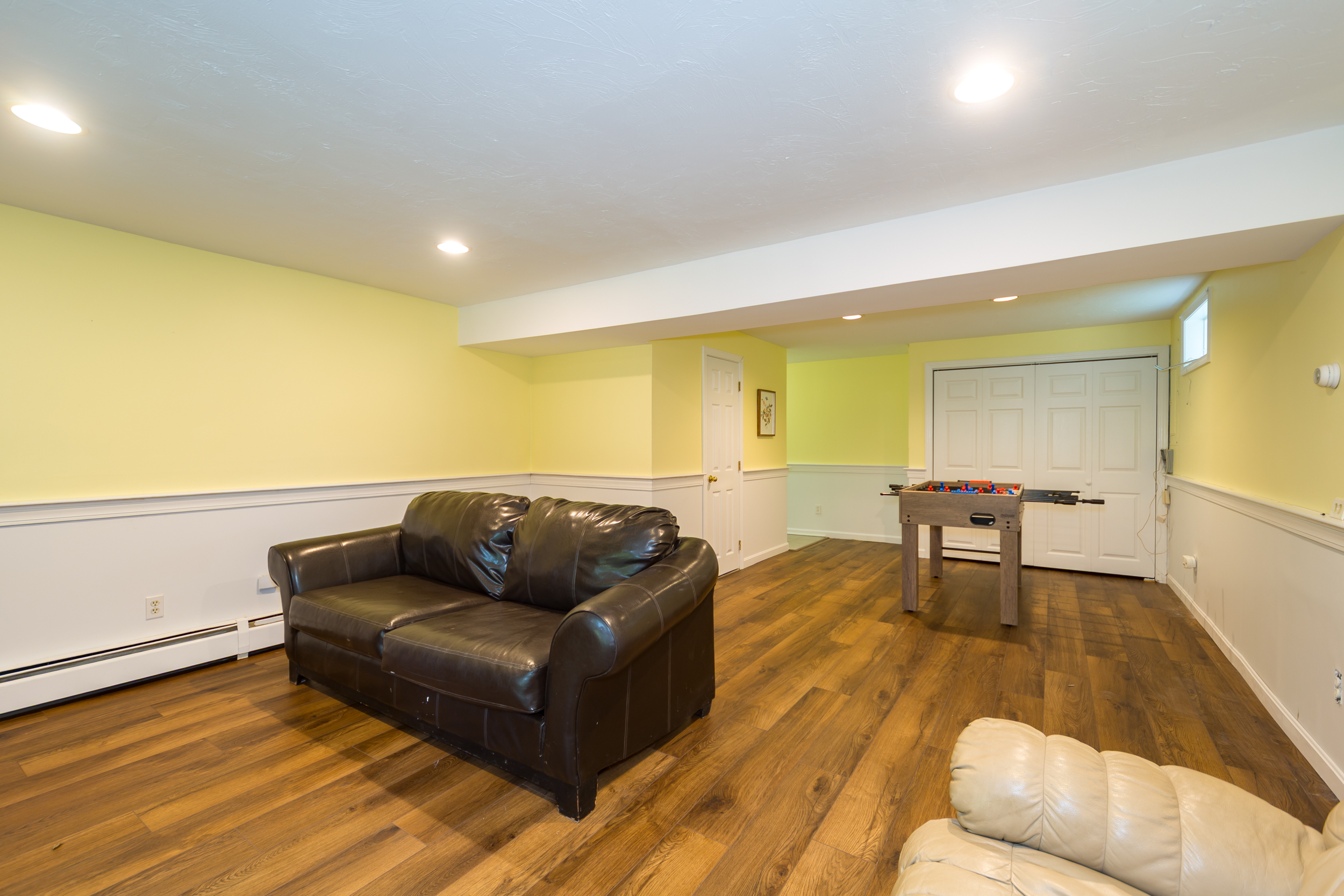 Additional living room perfect for movies or games.