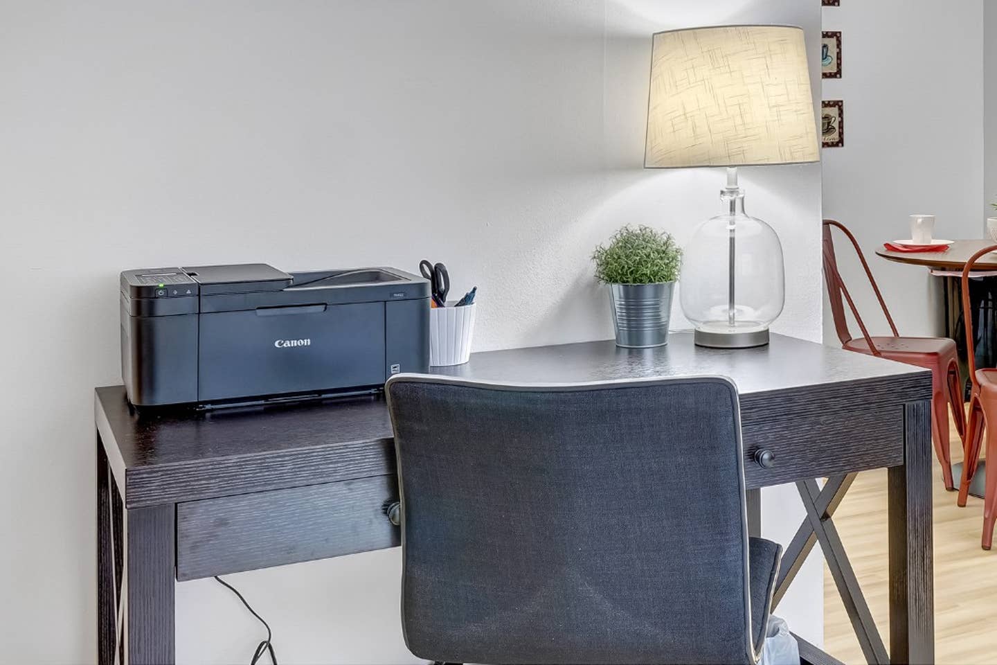 Work desk area and a white board above. Printer has been removed.