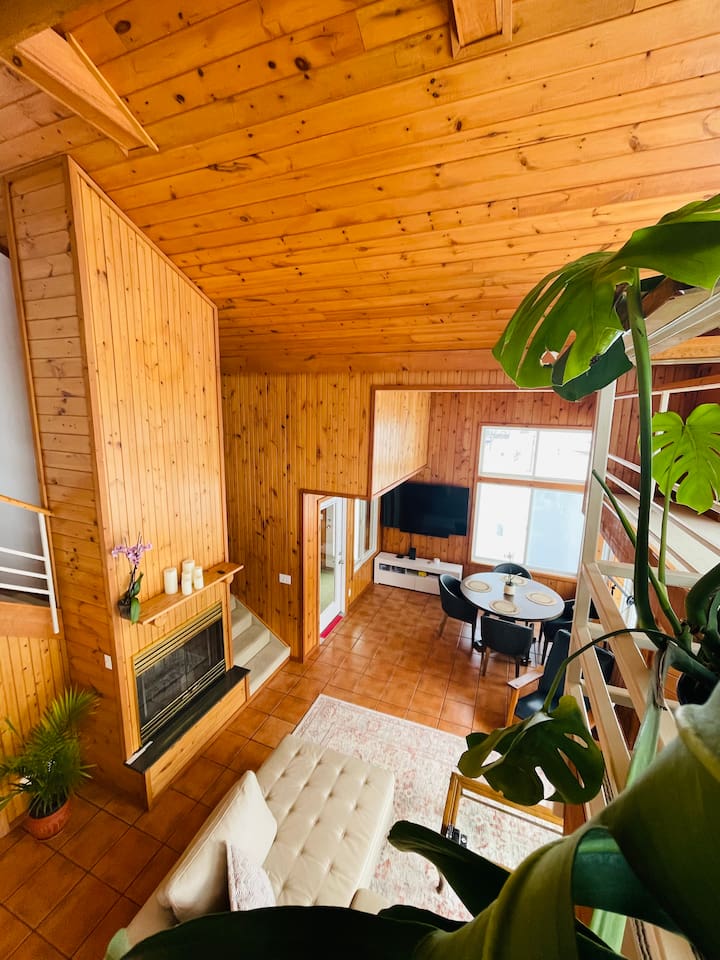 Cozy seating area with fireplace — perfect for relaxing evenings.