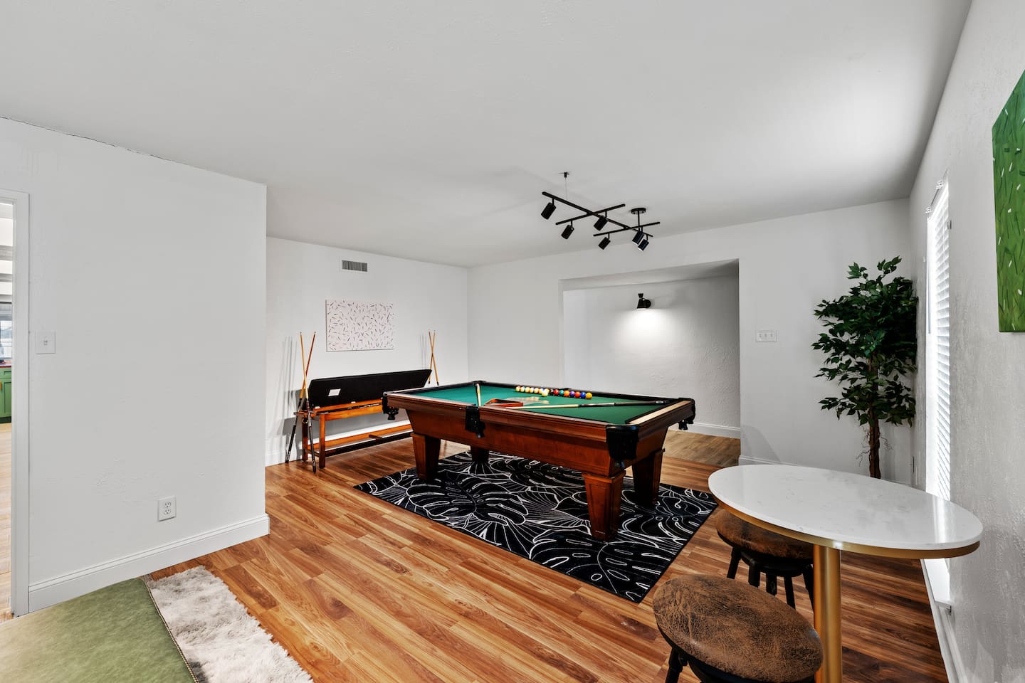 Massive game room with plenty of space for pool, seating, and game night memories.