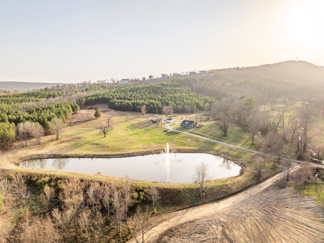 Scenic Retreat: Embrace nature's beauty by the tranquil pond and lush greenery!
