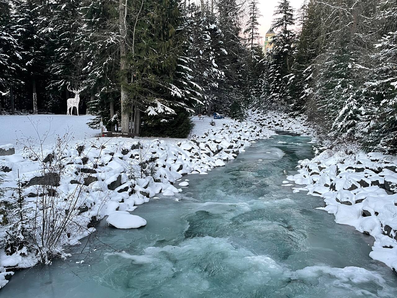 Rebagliati park (illuminated reindeer) is tucked beside the covered bridge between the Upper and Lower Village and bordered by Fitzsimmons Creek.  The covered bridge is less than 100 metres from your front door. This is literally your back yard.