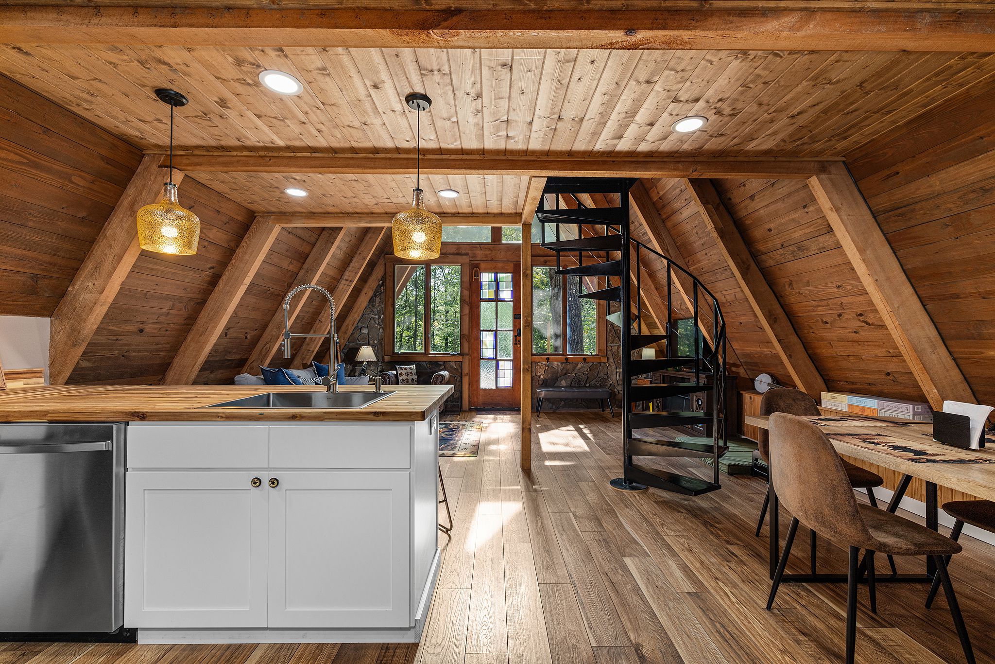 The open floor plan means the dining table is steps away from the kitchen.