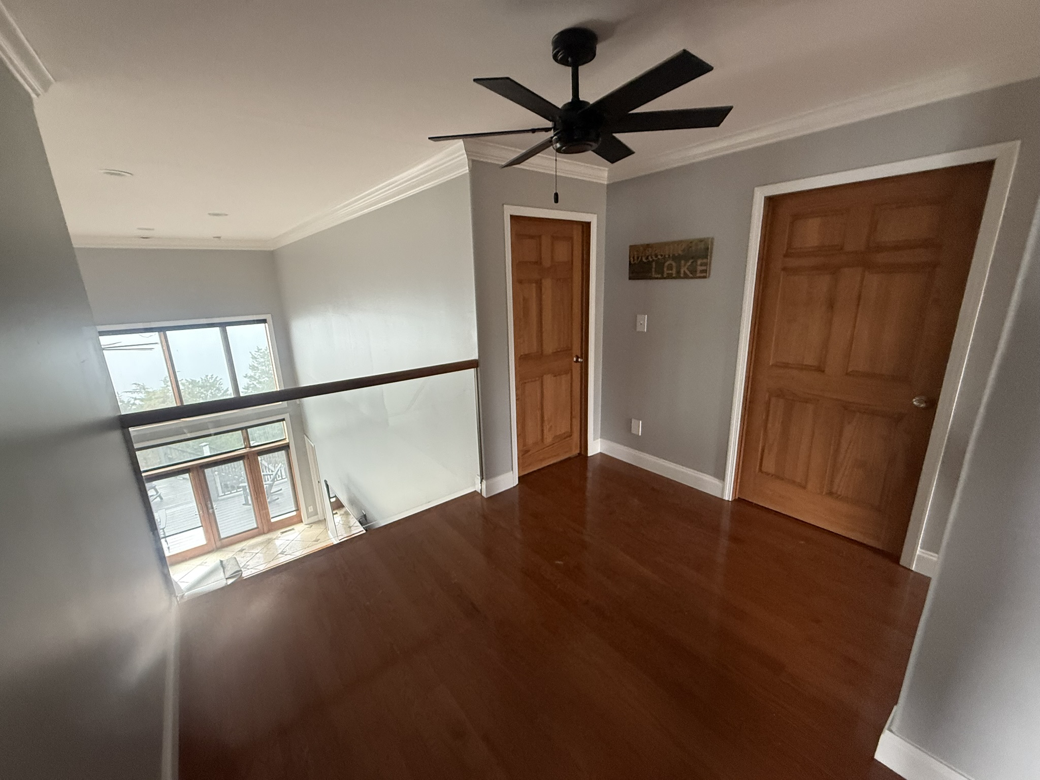 Upstairs hallway with a view down to the living room