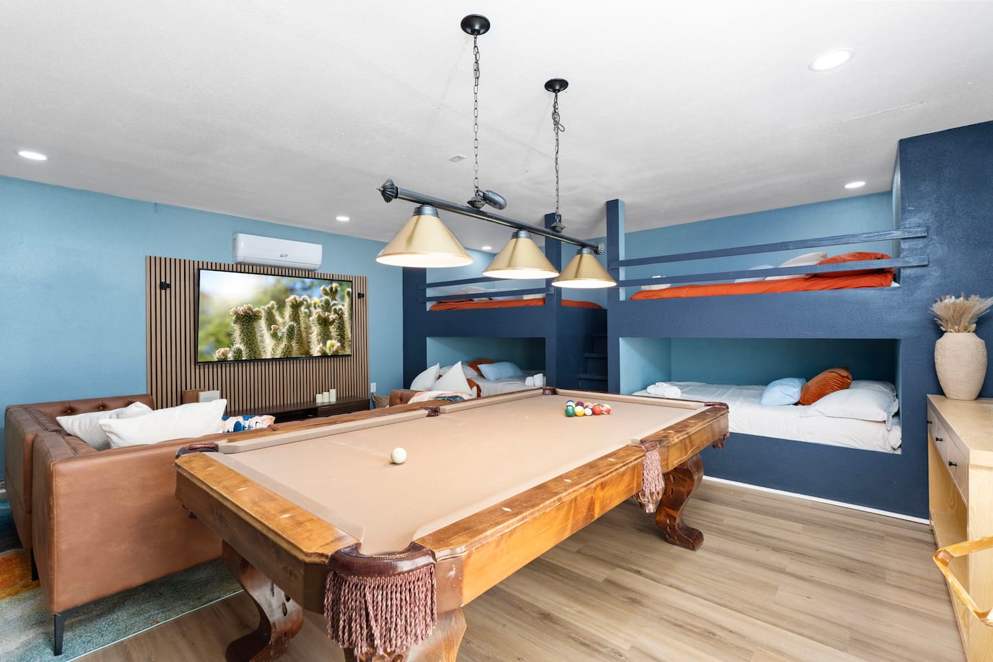 Custom bunk game room with pool table.