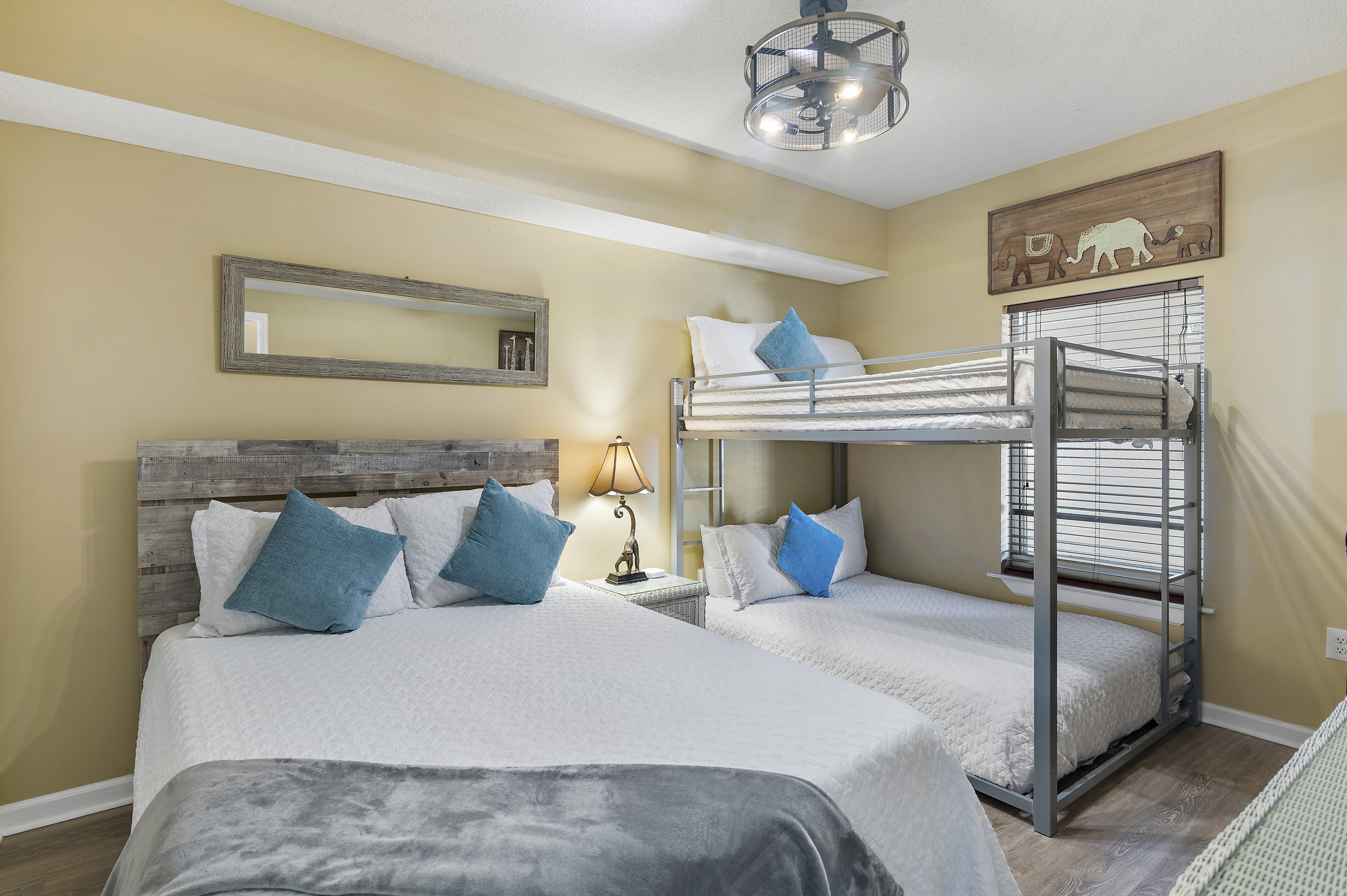 3rd bedroom has QUEEN BED, FULL OVER FULL BUNK BEDS, Smart TV w/ cable, private bathroom, and closet