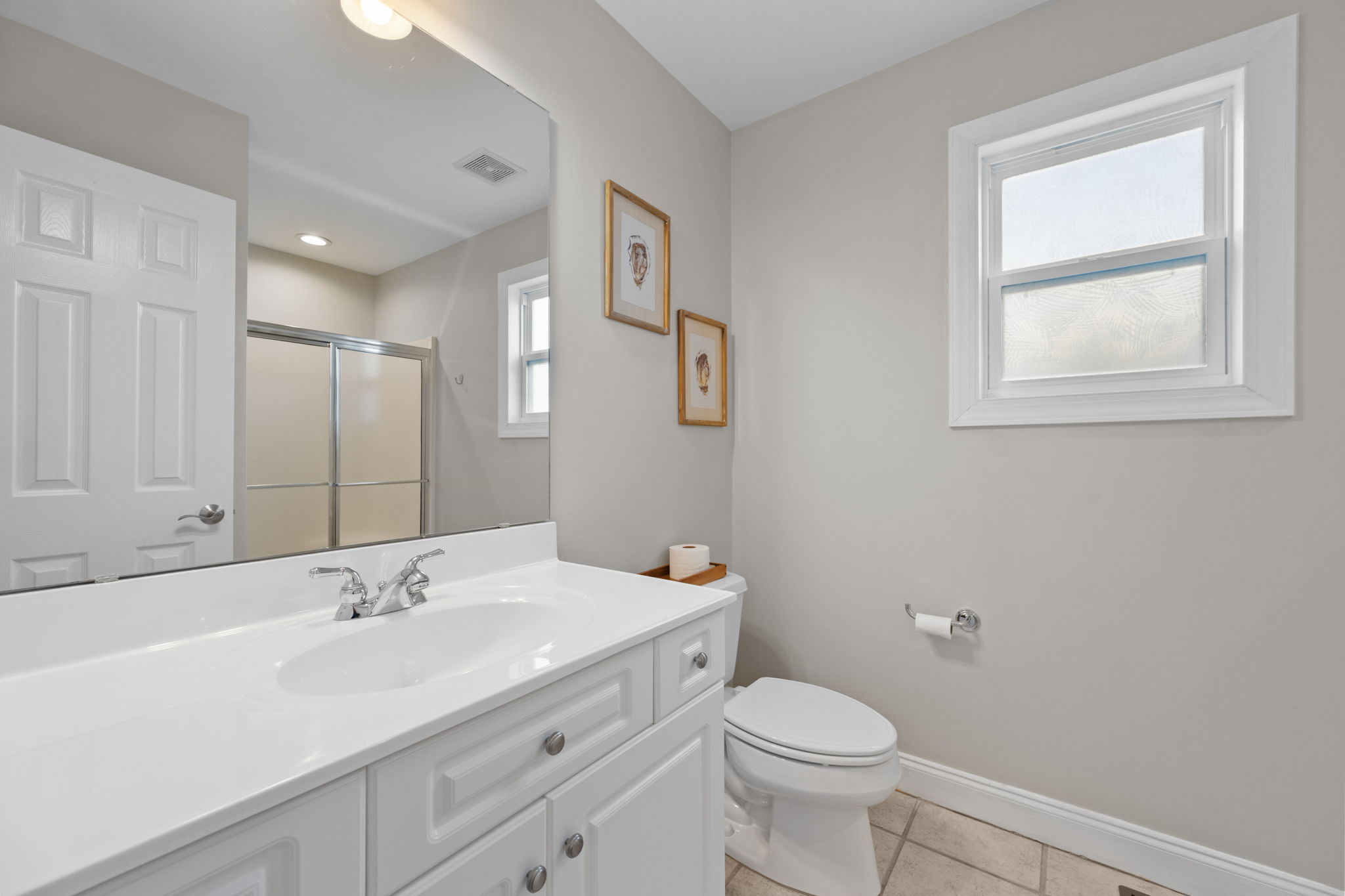 Getting ready is made easy with this ensuite bathroom