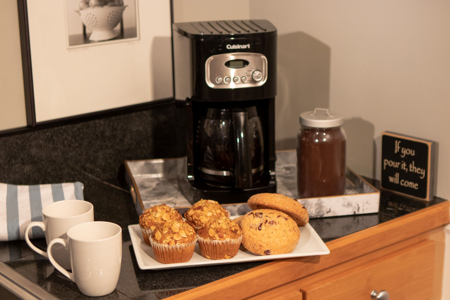 12-cup drip coffee maker and initial supply of ground coffee provided
