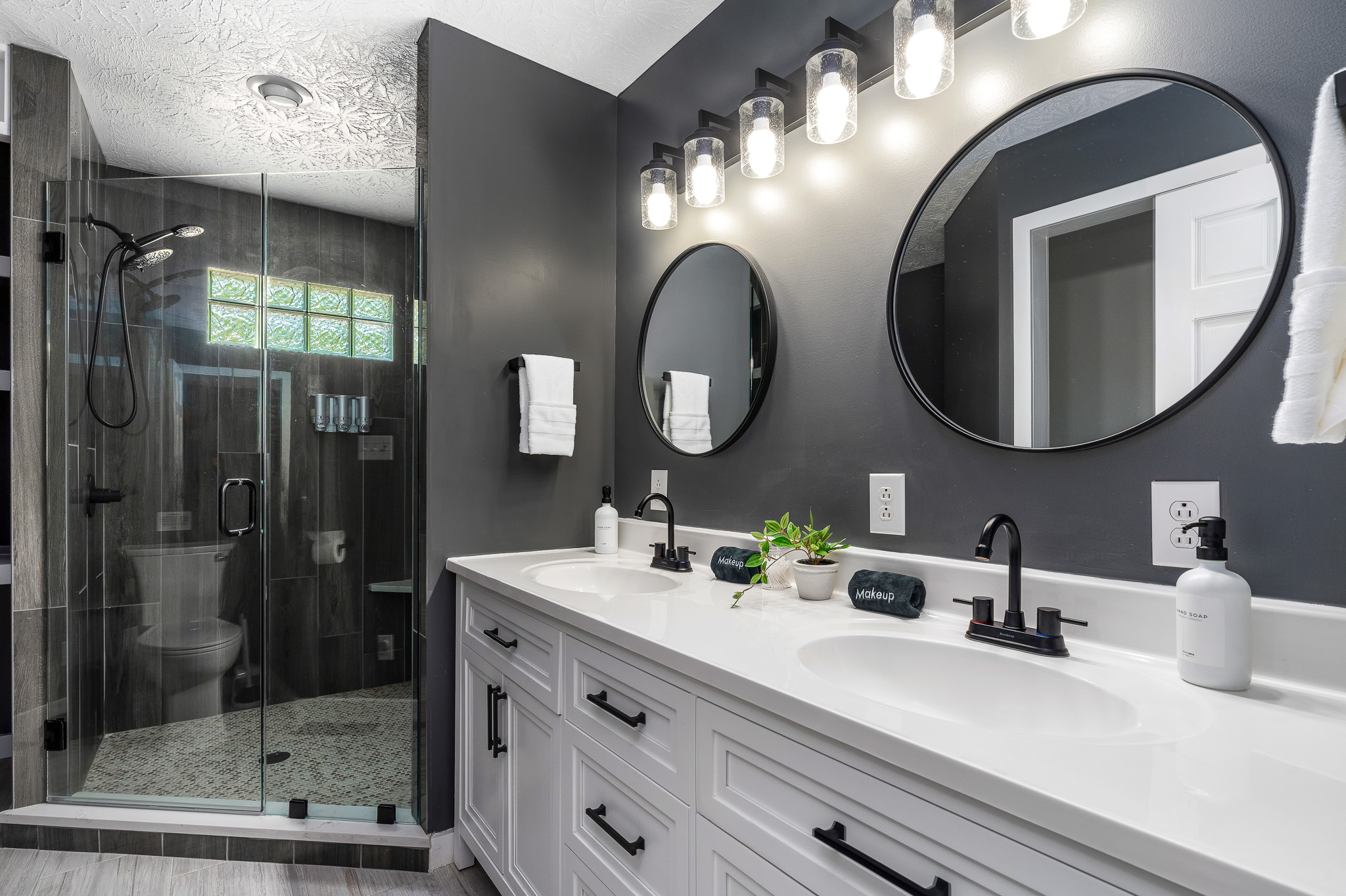 Your own private spa With dual vanities, a sleek walk-in shower, and plush towels ready to go, this bathroom is all about luxury, light, and that just-checked-into-a-hotel feeling. 🚿