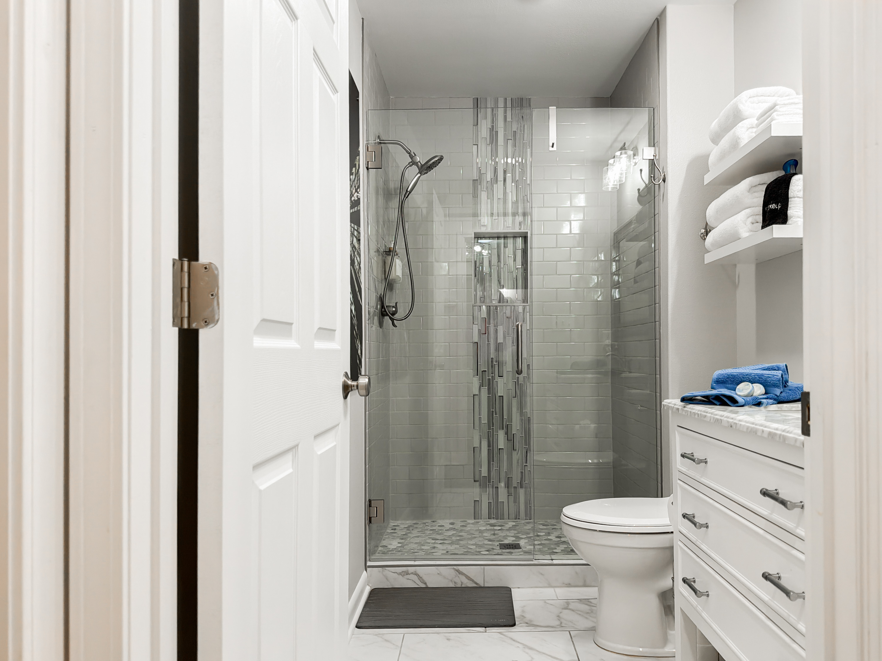 Step into the Oaklawn suite's walk-in shower — a private ensuite so your morning starts on your own schedule.