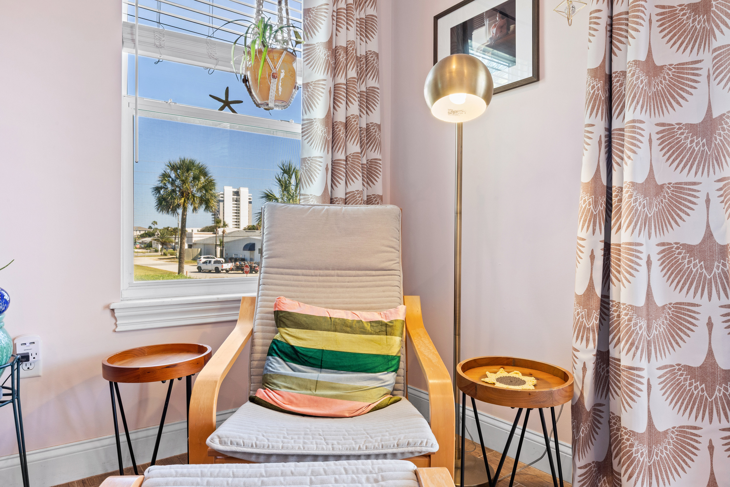 Sunny window nook with a beach view, perfect for morning coffee and a good book!