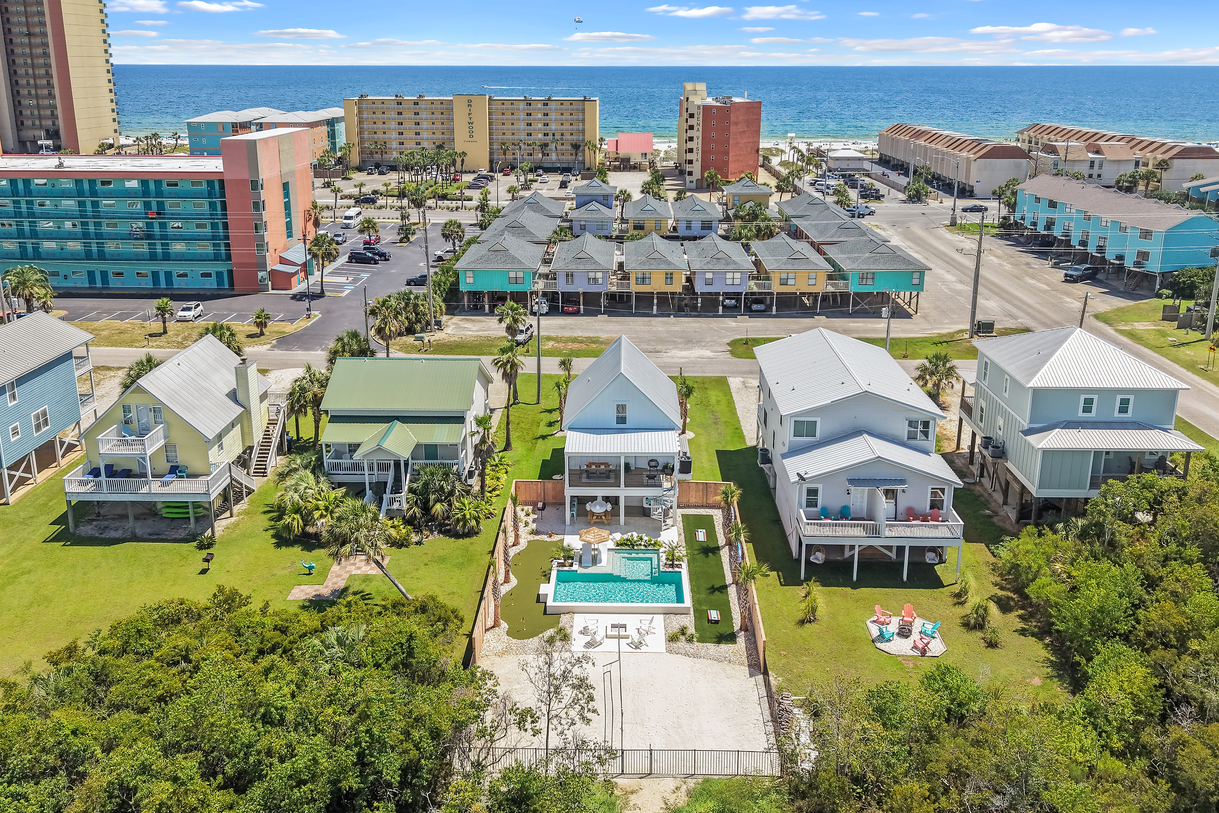 Aerial perspective showing just how close the home sits to the Gulf shoreline.